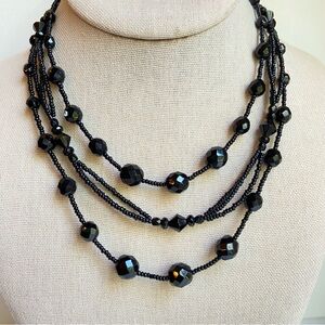 White House Black Market black glass seed and faceted bead multi strand necklace